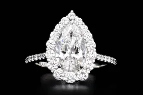 1.83 Carat Pear Diamond Graduated Halo Engagement Ring in Platinum GIA Certified