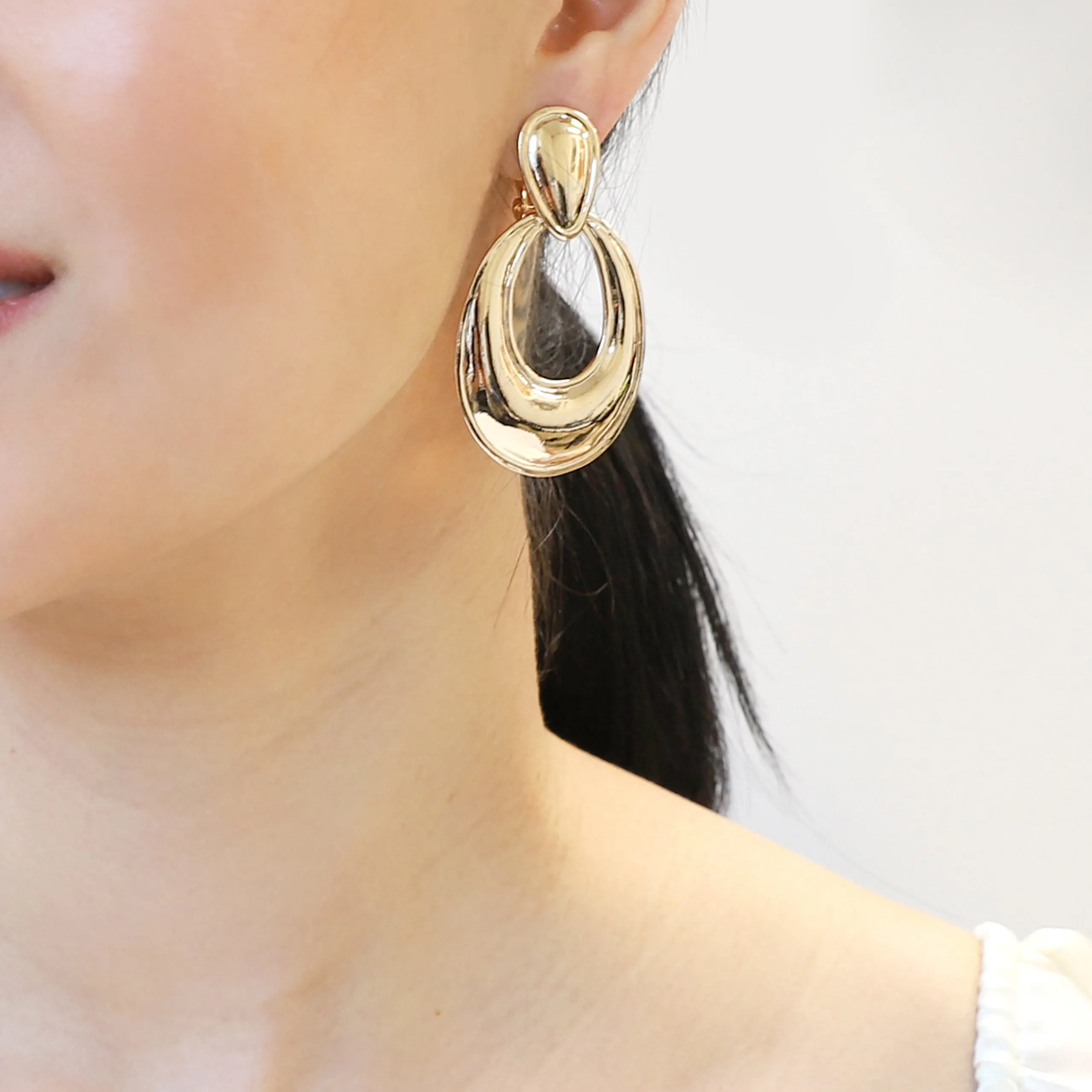 Divine Teardrop Metal Clip-on Earrings